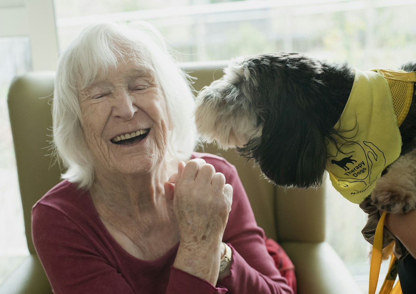 Smiling woman with her dog